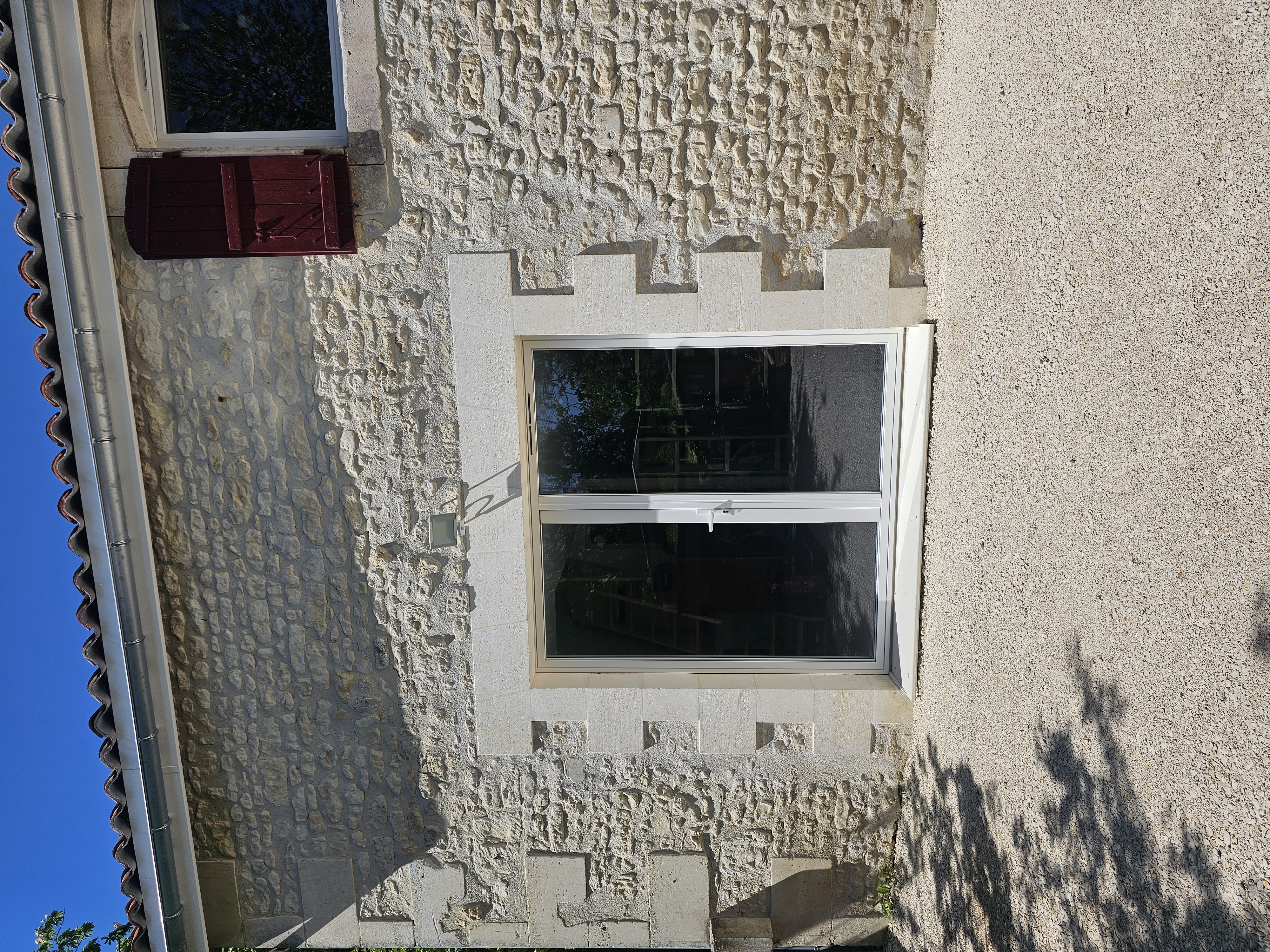 Ouverture mur en moellons et pose d’une baie vitrée